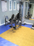 Basement dance and exercise floor with Sport Court Response tiles.