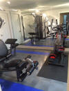 Home exercise room floor with equipment installed