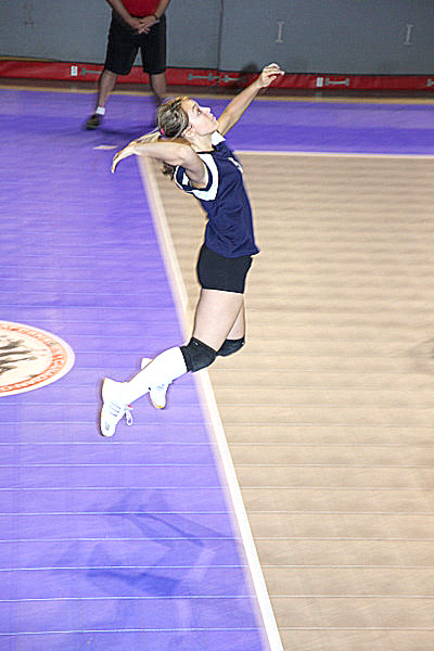 Super Serve on a Sport Court volleyball court.